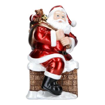 Santa sitting on chimney poly 50,5 cm